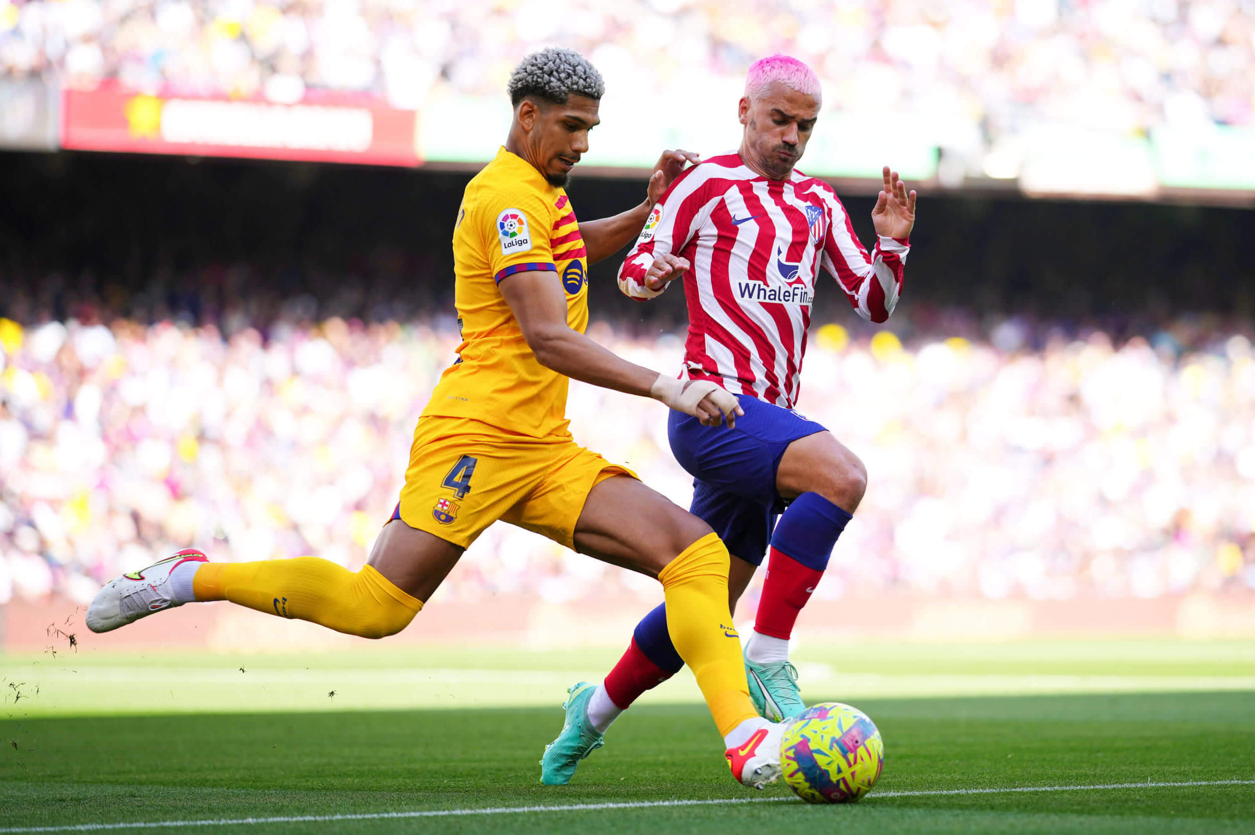 Atletico Madrid's Griezmann in Doubt for Crucial Barcelona Clash: A Look at La Liga's Fierce Rivalry