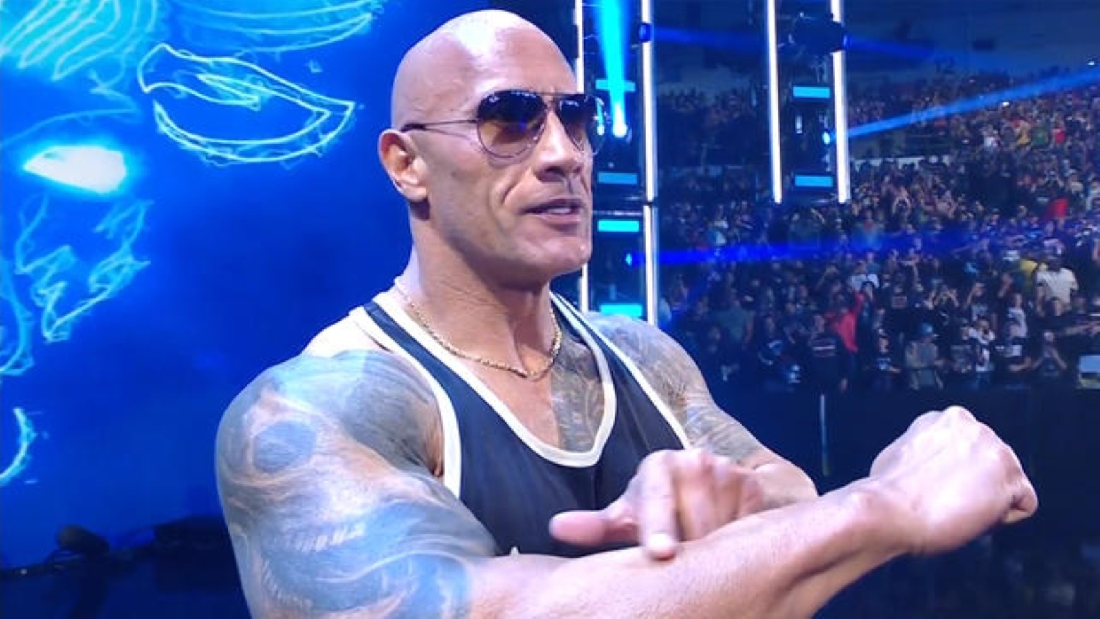 The Rock's Strategic Maneuver: Aligning with The Bloodline and Predicting a WWE Showdown